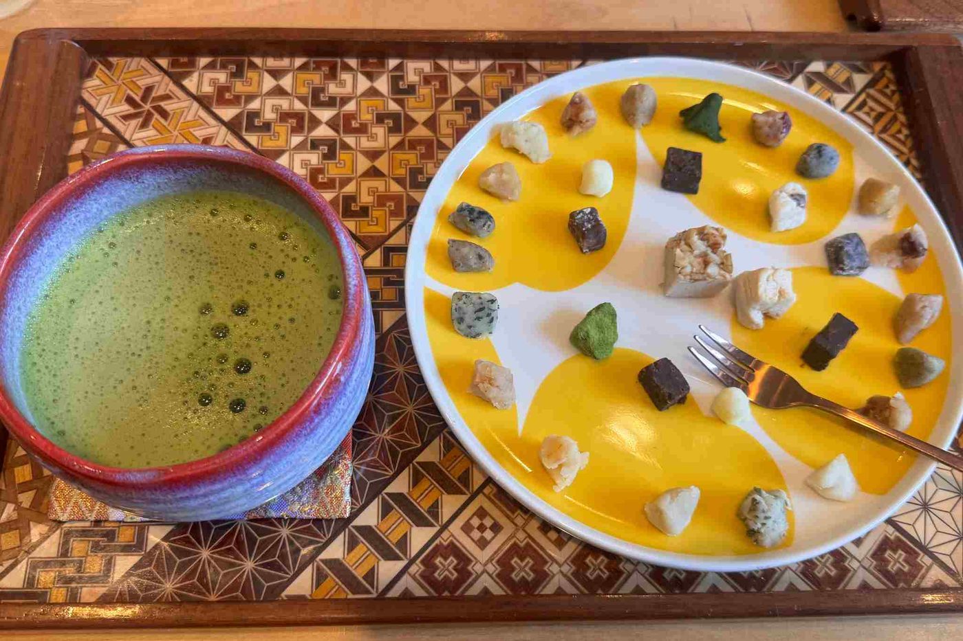 Matcha and a plate of traditional wagashi sweets at a Hakone tea shop